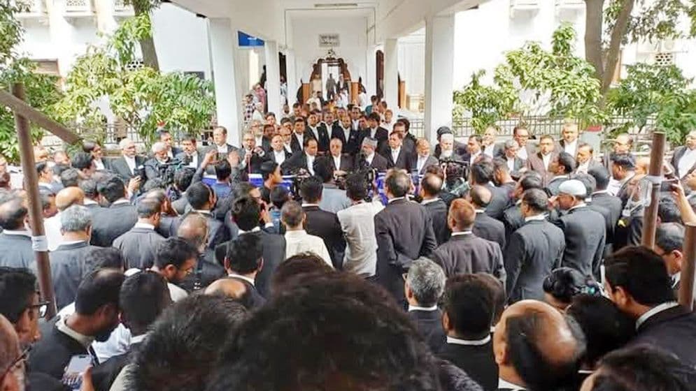 সাবেক প্রধান বিচারপতি খায়রুল হককে গ্রেপ্তারের দাবিতে সমাবেশ